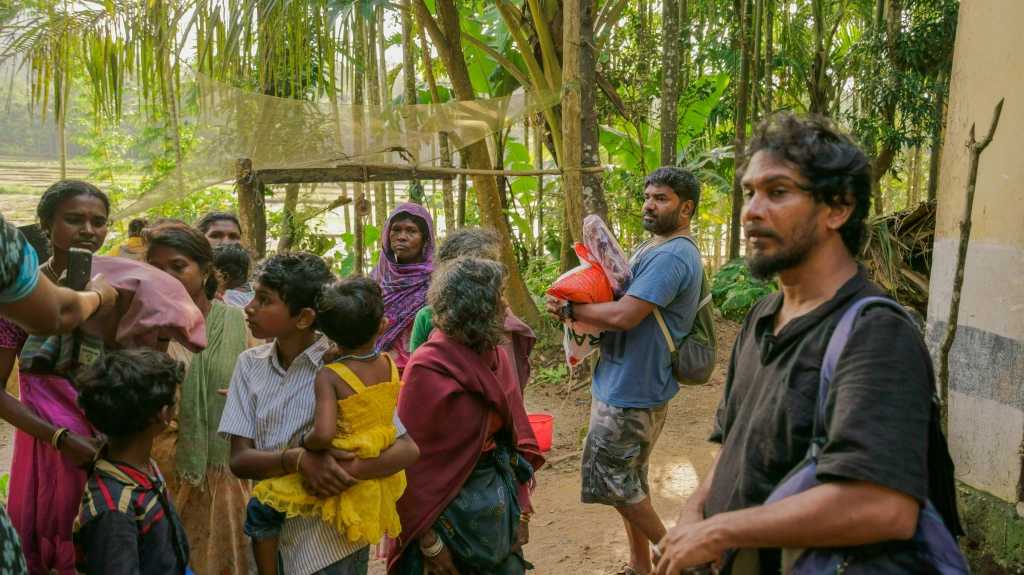 Friends distributing relief materials…