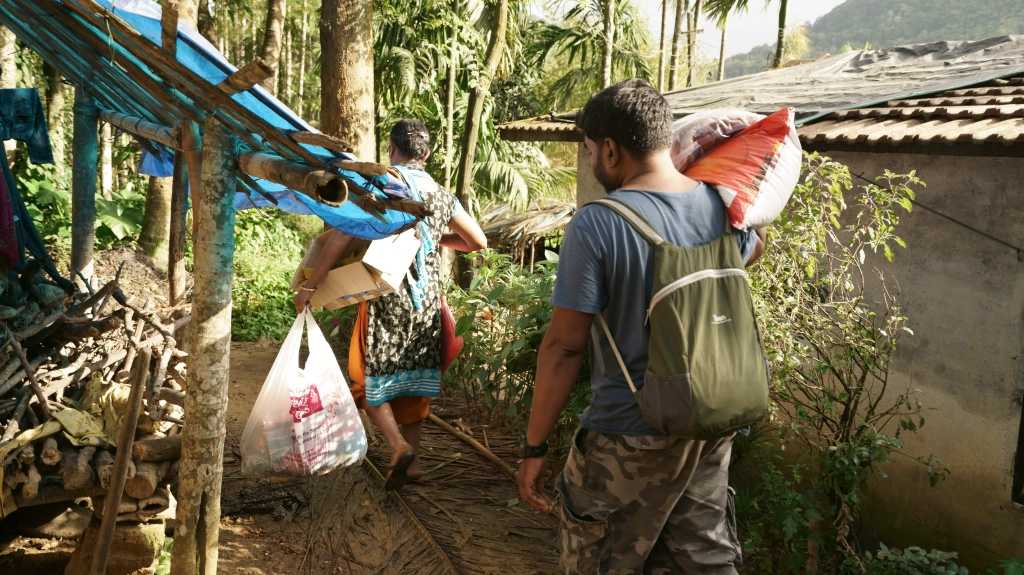 The 3 plus KM trek to reach the relief camps, with relief materials…..